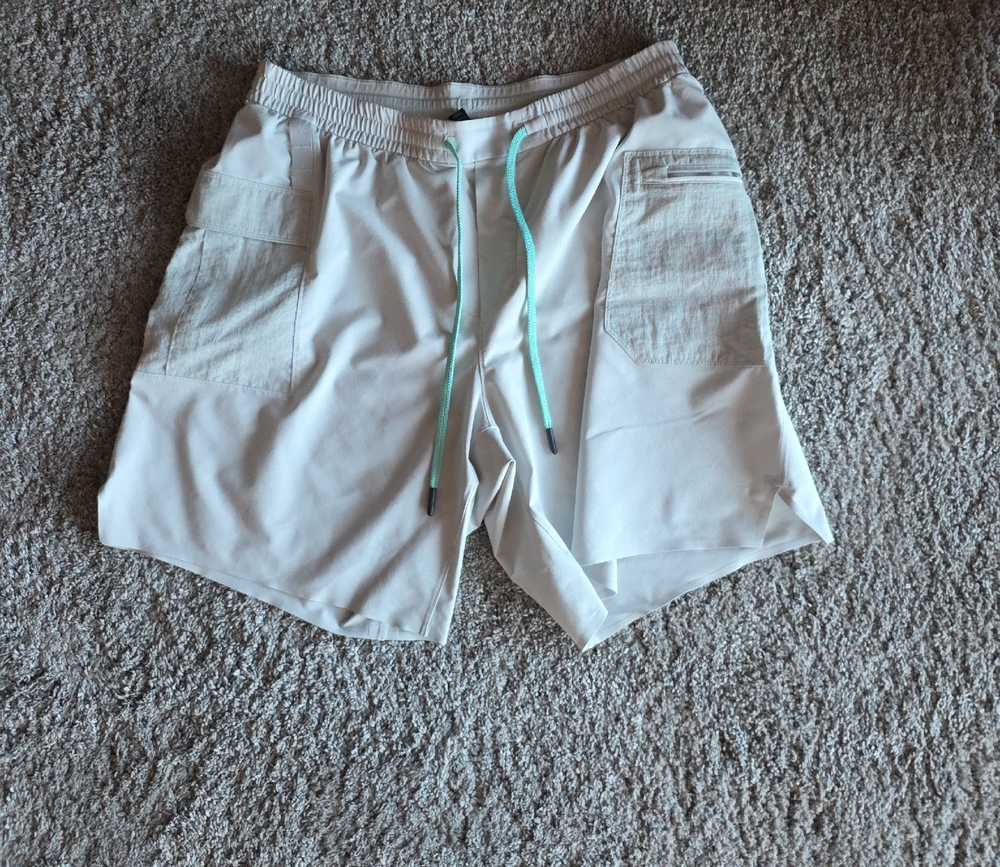 Lululemon Athletica Cream Shorts with Teal Drawstring